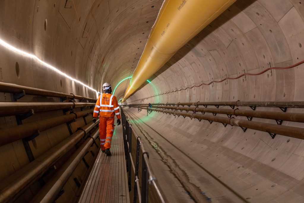 A HS2 Engineer inspecting the inside of a tunnel