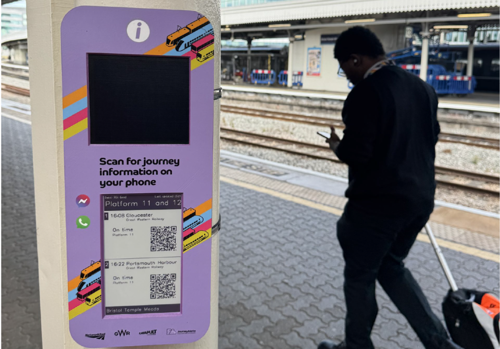Journey Alerts travel assistance podium with QR code to access personalised public transport information