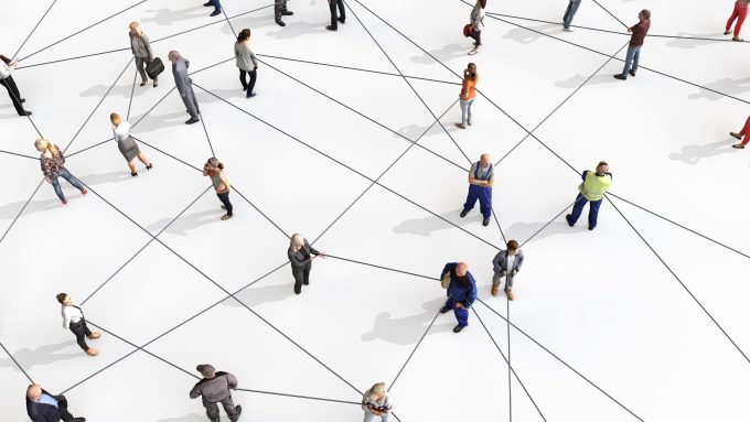 Large group of diverse people connected by lines.